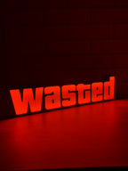 Wasted LED sign 3D printed and glowing on a shelf as gamer room decor
