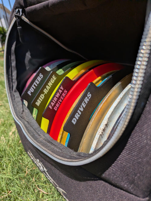 Four labeled disc golf disc separators in custom colors